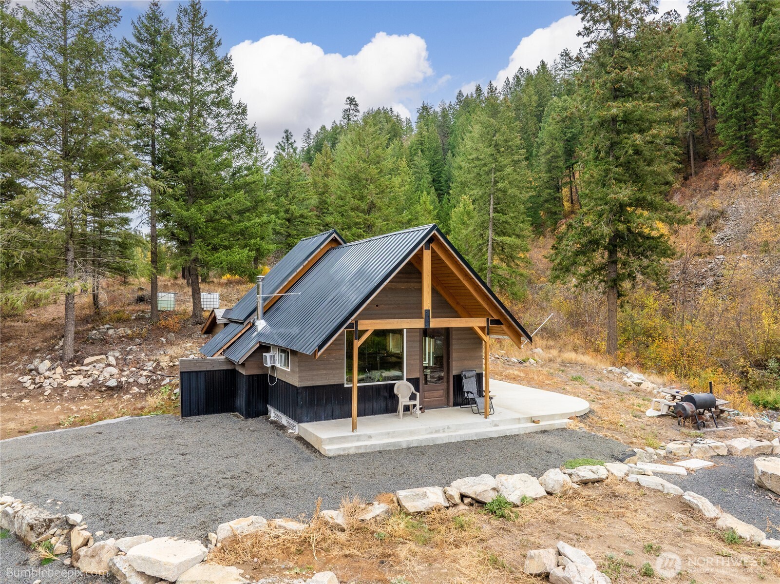 8 Camden Road Elk, WA 99009 - Photo 28 of 29 a view of a house with a yard