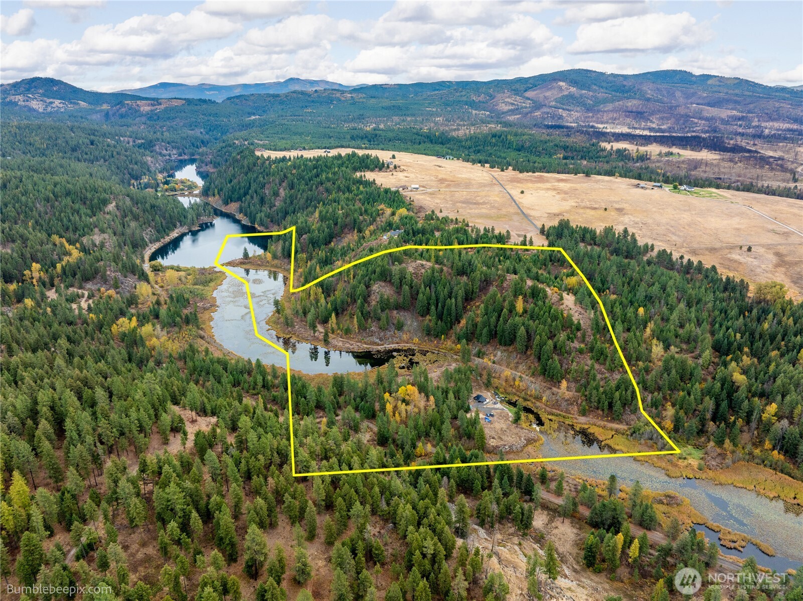 8 Camden Road Elk, WA 99009 - Photo 29 of 29 an aerial view of a house with mountain view