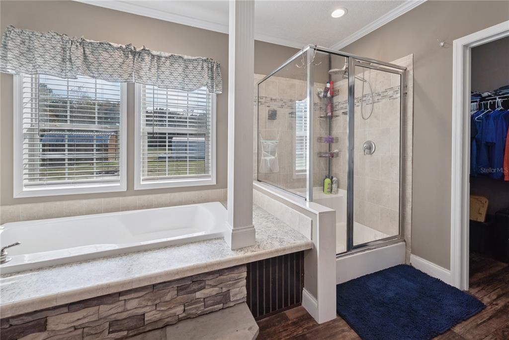 129 Perry Road, Unit 1 Hawthorne, FL 32640 - Photo 24 of 58 a bathroom with a bathtub and a shower