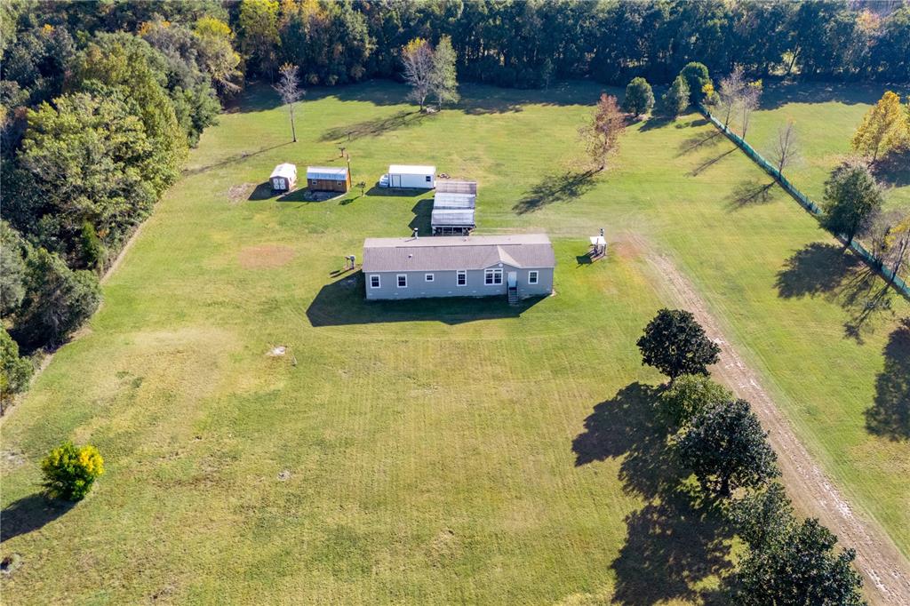 129 Perry Road, Unit 1 Hawthorne, FL 32640 - Photo 4 of 58 a view of swimming pool with a yard