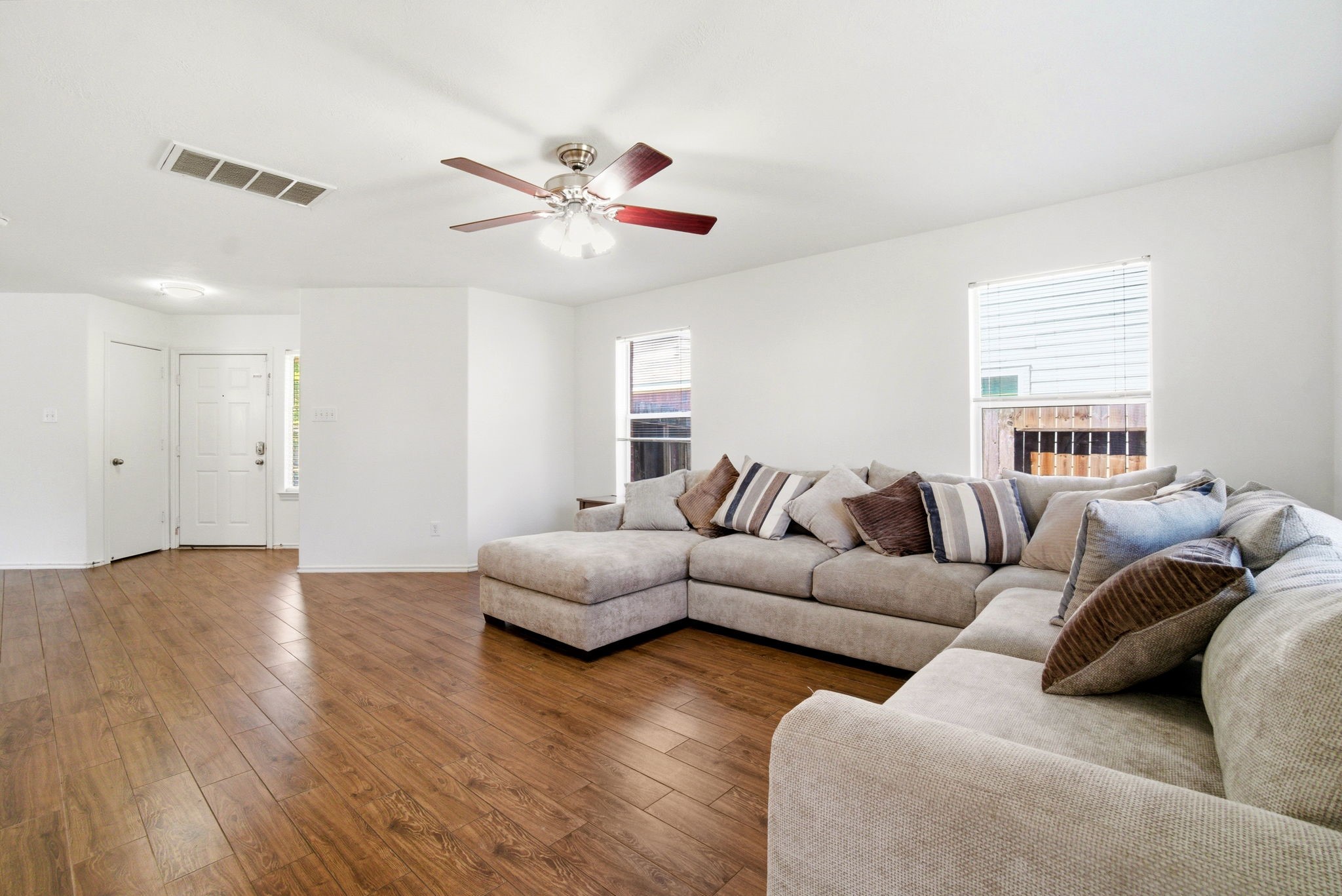 1607 Redbud Grove Court Conroe, TX 77301 - Photo 1 of 21 Bright and open living area with updated flooring and abundant natural light