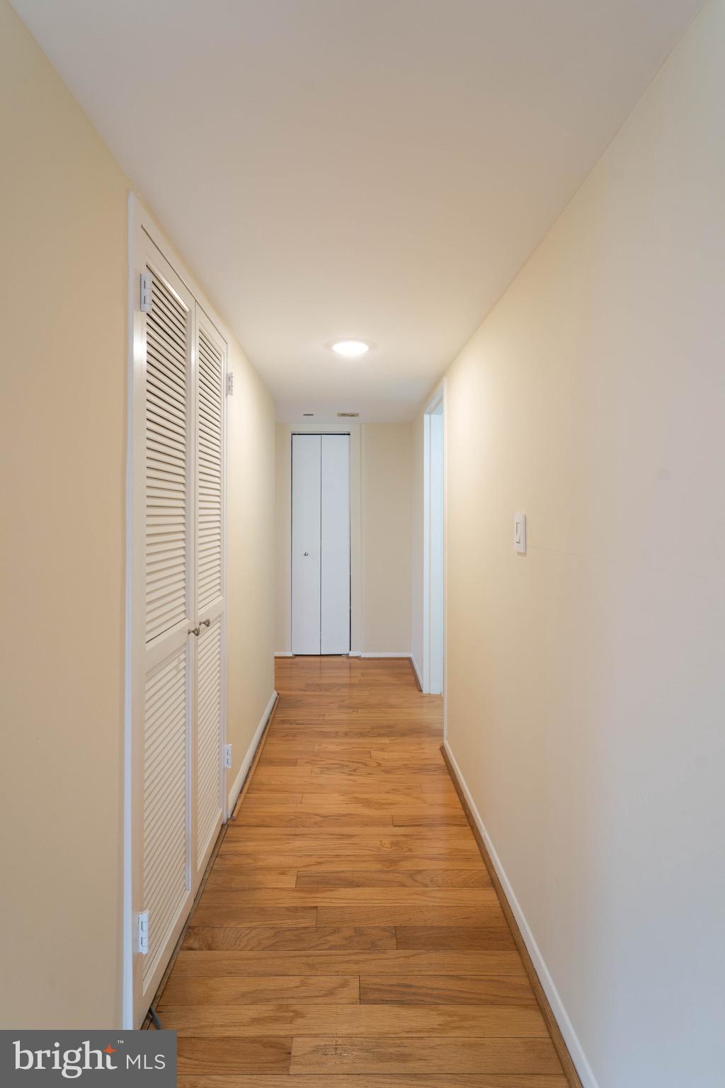 1808 Old Meadow Road, Unit 805 McLean, VA 22102 - Photo 15 of 58 a view of hallway with wooden floor