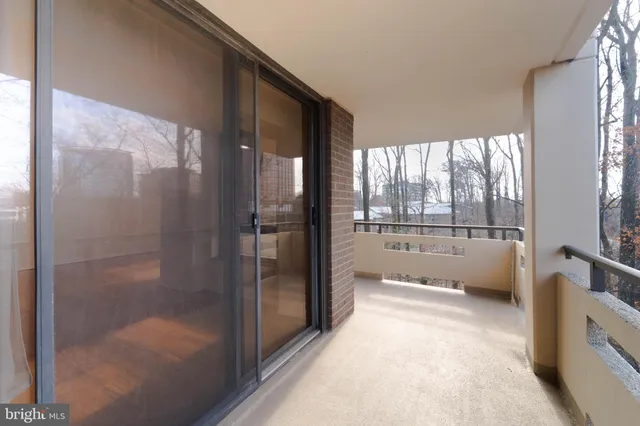a city street lined with buildings and trees