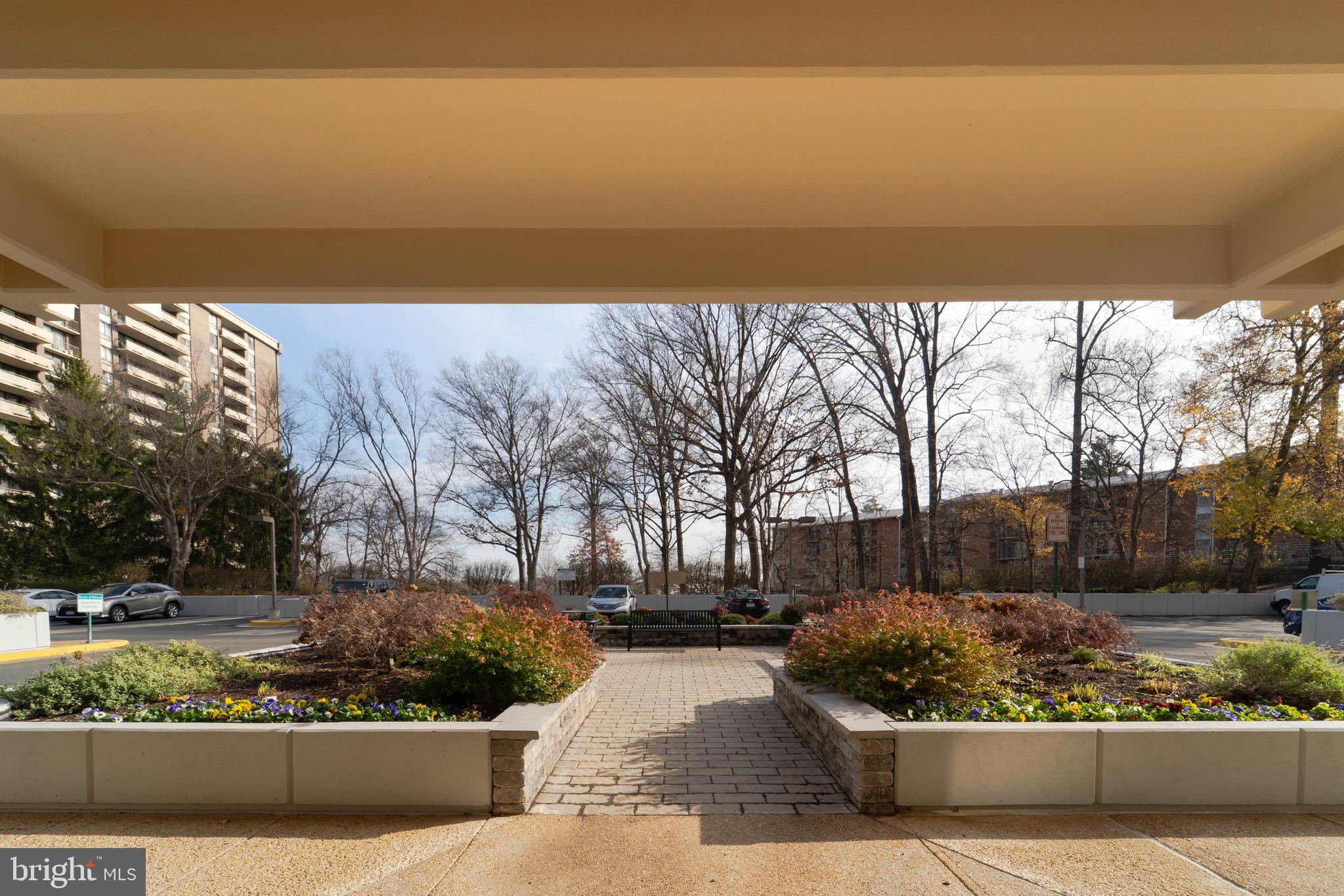 1808 Old Meadow Road, Unit 805 McLean, VA 22102 - Photo 33 of 58 a view of swimming pool with outdoor seating and plants