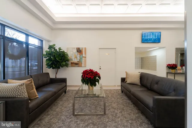 a kitchen with stainless steel appliances a refrigerator stove microwave and cabinets