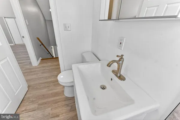 a bathroom with a sink and a toilet