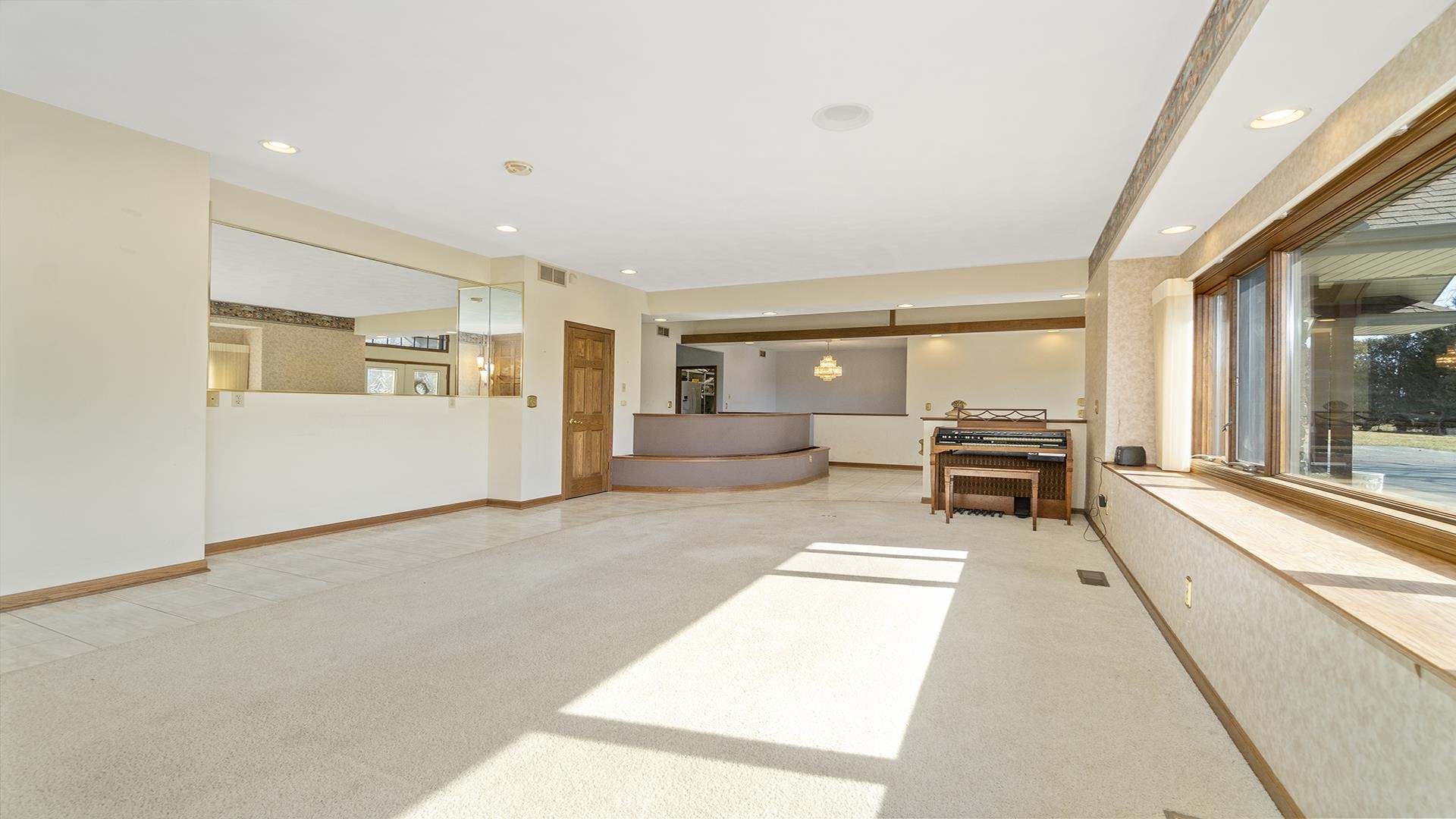 7674 West Pines Road Polo, IL 61064 - Photo 30 of 60 a living room with furniture and a large window