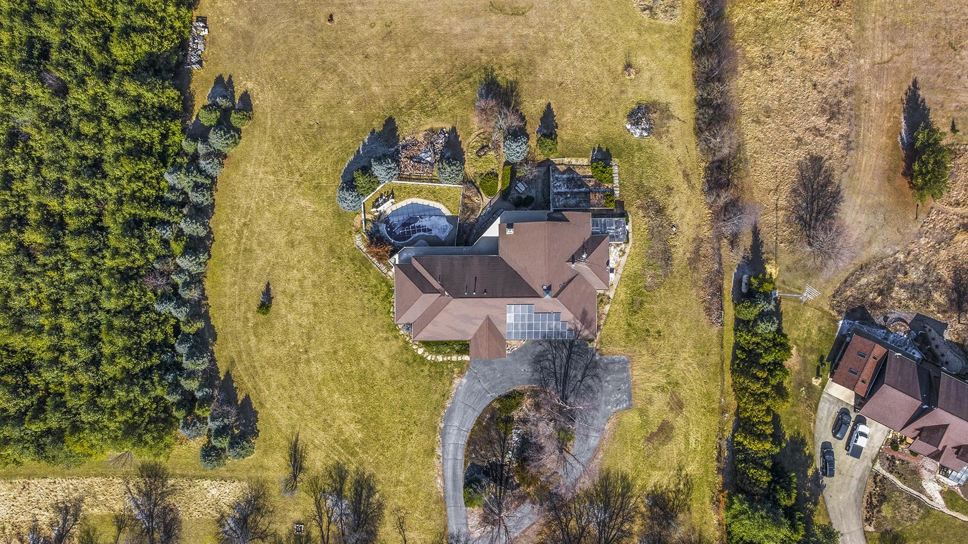 7674 West Pines Road Polo, IL 61064 - Photo 59 of 60 view of a house with a swimming pool