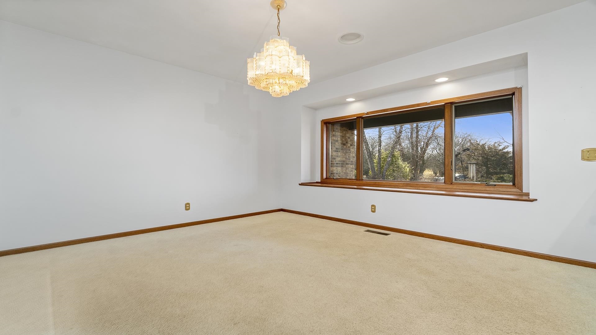 7674 West Pines Road Polo, IL 61064 - Photo 6 of 60 a view of an empty room with a window