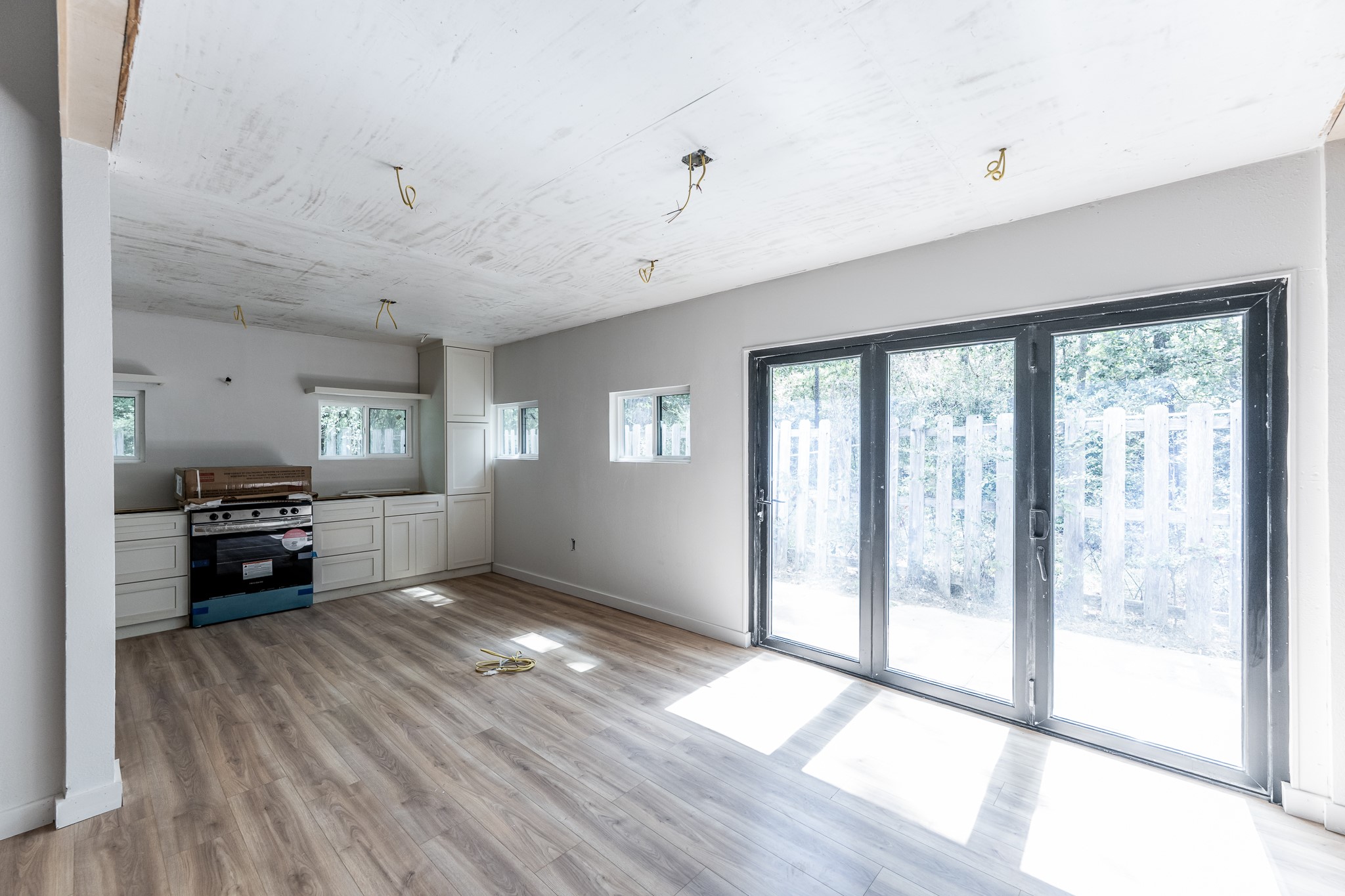 28600 Rantoul Court Point Blank, TX 77364 - Photo 13 of 33 a living room with furniture and large windows