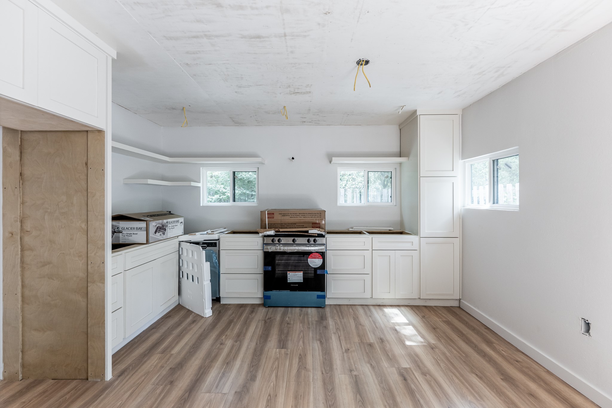 28600 Rantoul Court Point Blank, TX 77364 - Photo 14 of 33 a kitchen with granite countertop a refrigerator stove top oven and sink