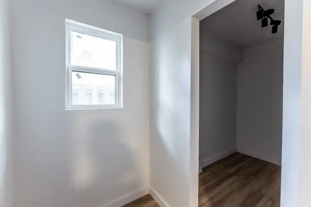 an empty room with windows