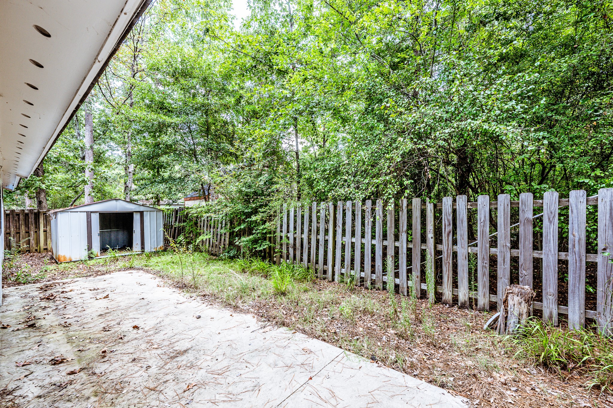 28600 Rantoul Court Point Blank, TX 77364 - Photo 31 of 33 a front view of a house with a yard