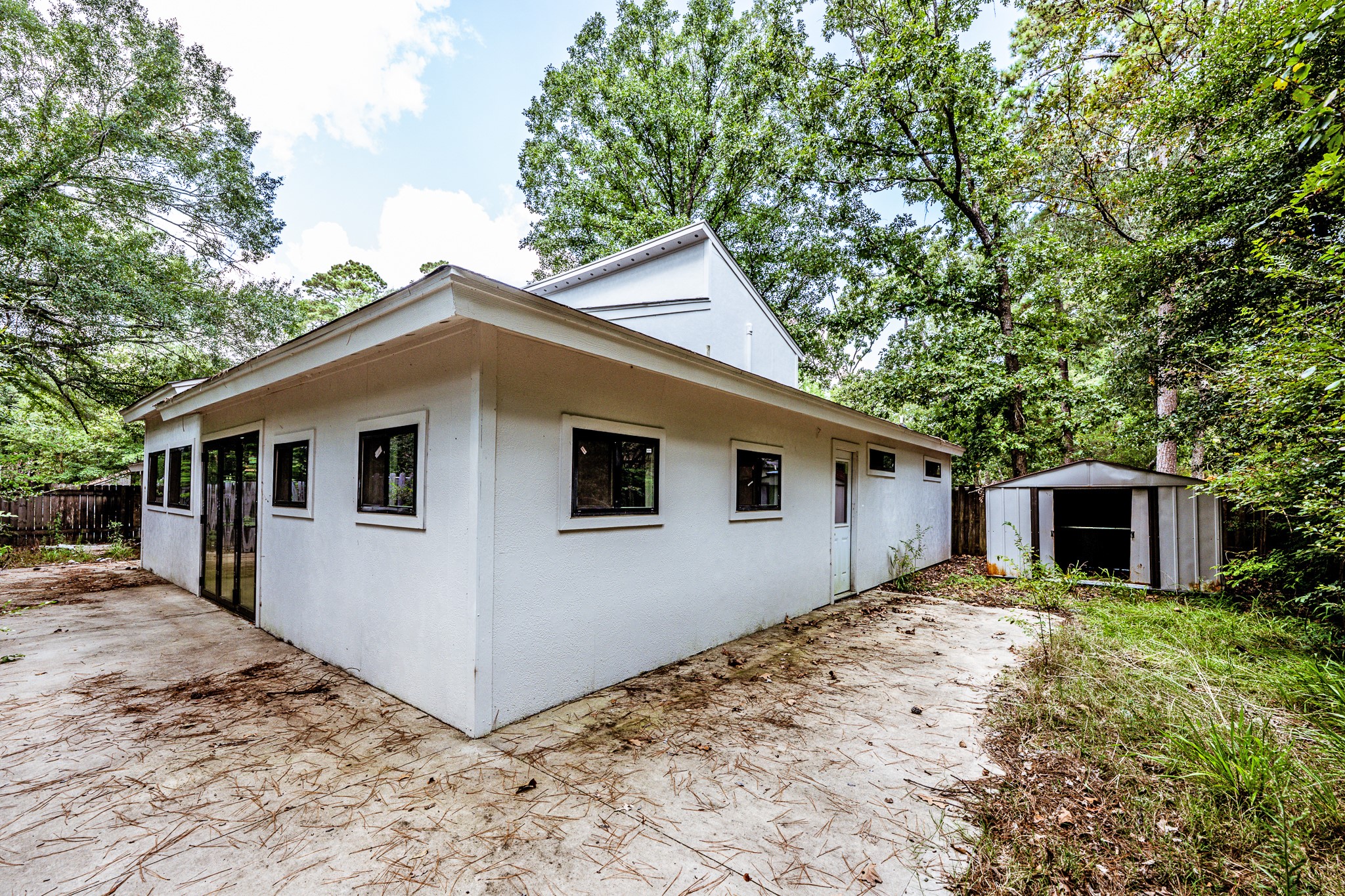 28600 Rantoul Court Point Blank, TX 77364 - Photo 32 of 33 a view of a house with a yard