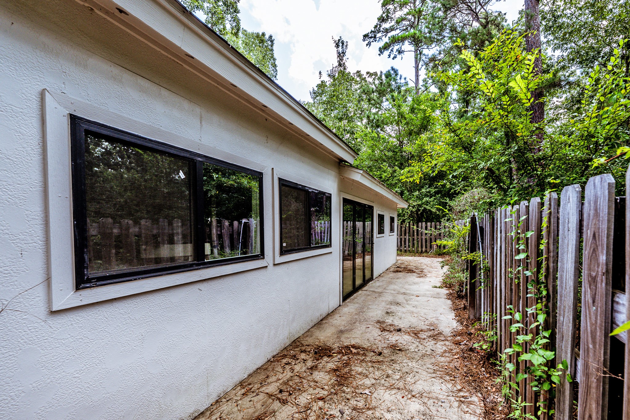 28600 Rantoul Court Point Blank, TX 77364 - Photo 33 of 33 a view of a house with a backyard