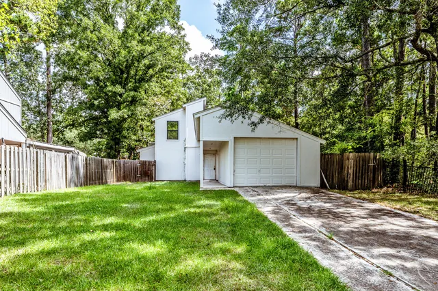 a view of a back yard of the house