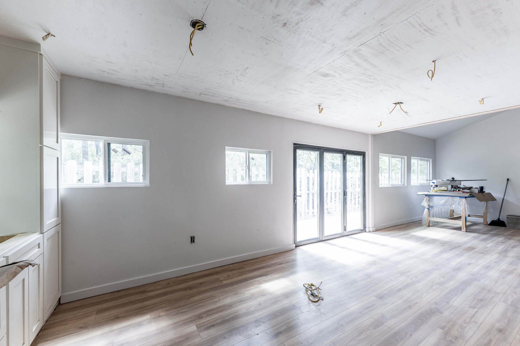 28600 Rantoul Court Point Blank, TX 77364 - Photo 8 of 33 a spacious bedroom with a bed and wooden floor