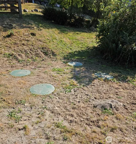 a view of a backyard of a house