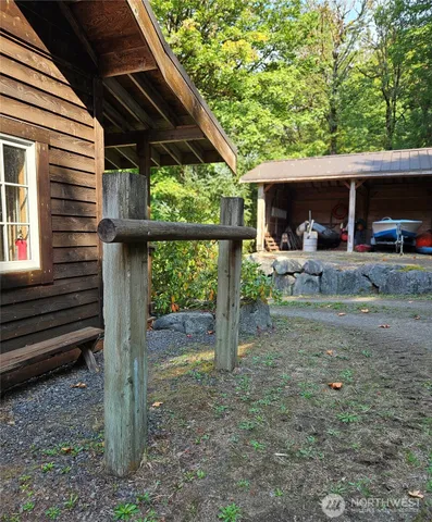 a view of a car park in front of a house