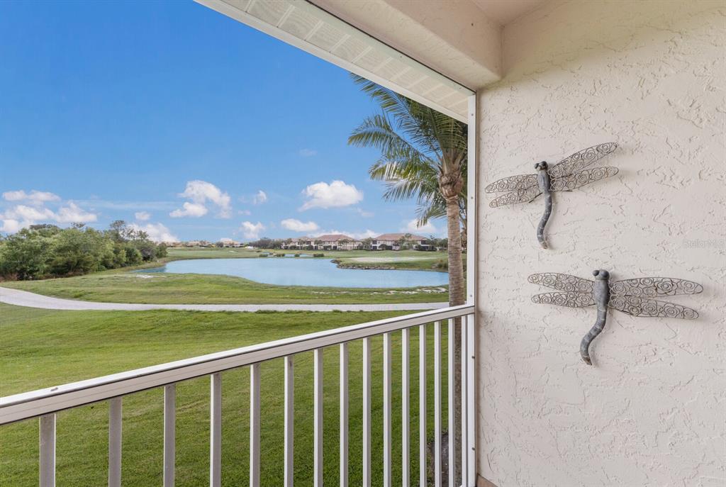 7179 Boca Grove Place, Unit 202 Lakewood Ranch, FL 34202 - Photo 19 of 46 a view of a balcony with an outdoor space