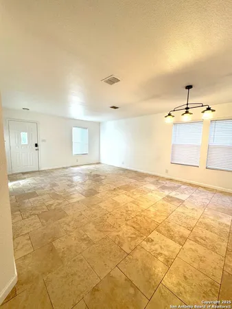 a view of a kitchen with a sink