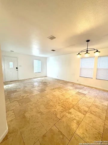 a view of a kitchen with a sink