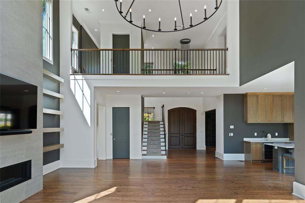 1285 Stuart Ridge Johns Creek, GA 30022 - Photo 14 of 89 a view of entryway and hall with wooden floor