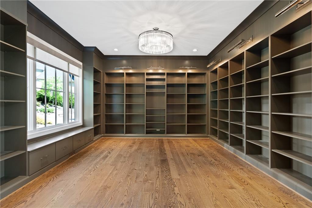 1285 Stuart Ridge Johns Creek, GA 30022 - Photo 15 of 89 a view of an empty room with a window and wooden floor