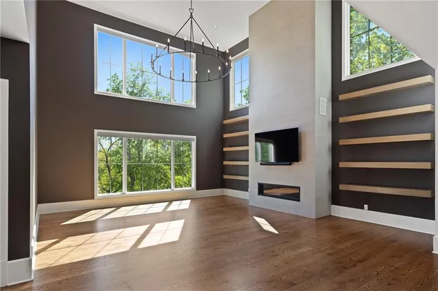 a view of room with window and ceiling fan