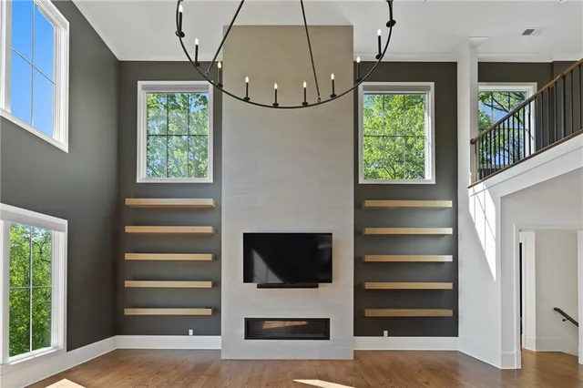 a view of room with window and ceiling fan