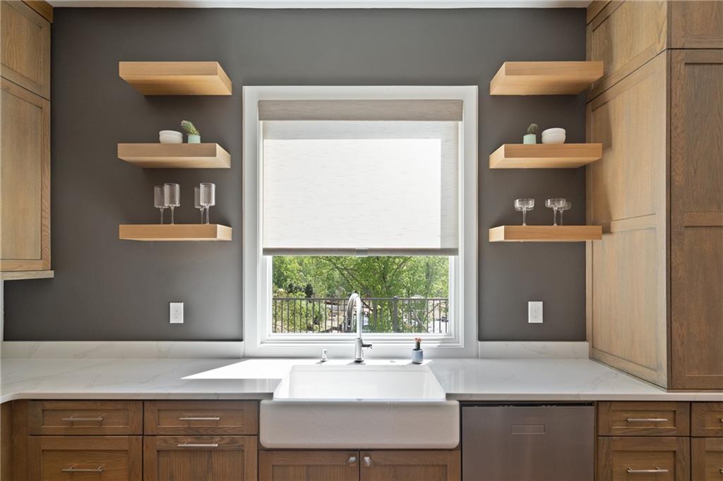 1285 Stuart Ridge Johns Creek, GA 30022 - Photo 26 of 89 a bathroom with a sink and a window