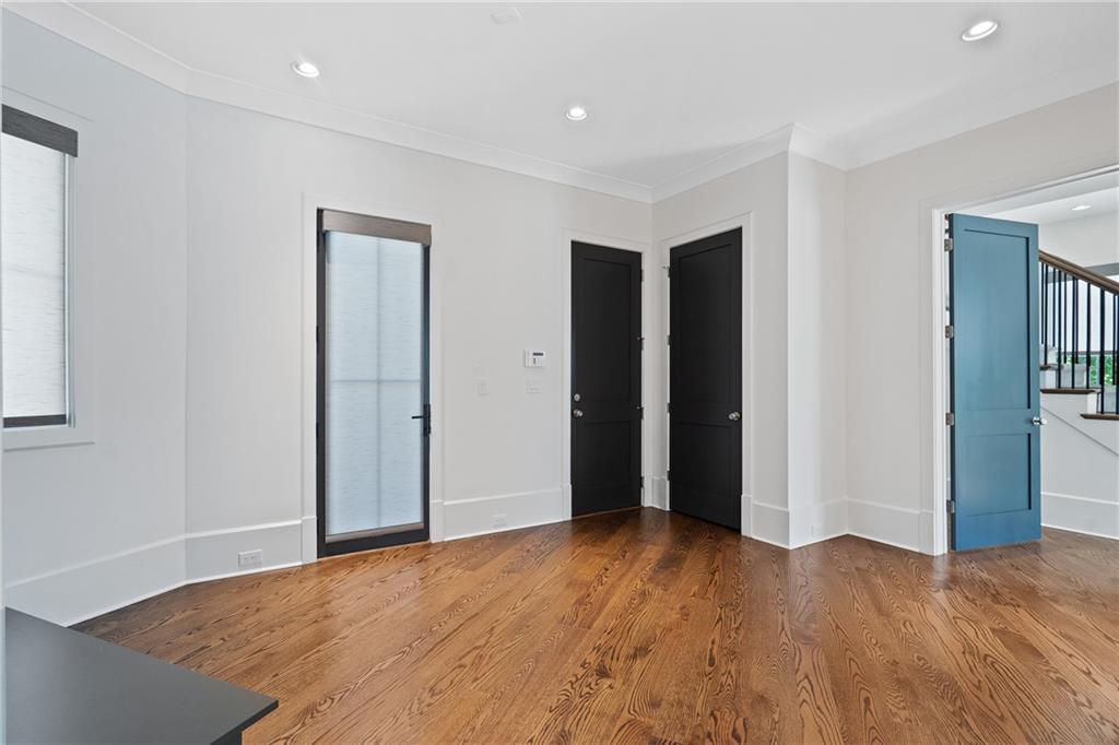 1285 Stuart Ridge Johns Creek, GA 30022 - Photo 54 of 89 a view of an empty room with wooden floor
