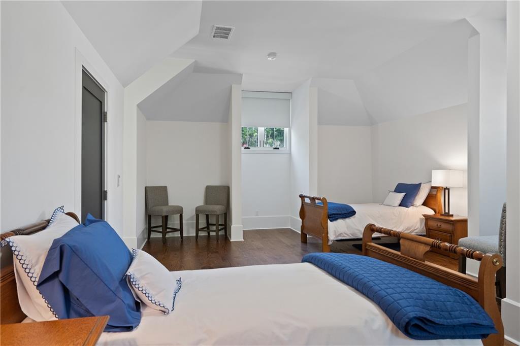 1285 Stuart Ridge Johns Creek, GA 30022 - Photo 59 of 89 a living room with furniture