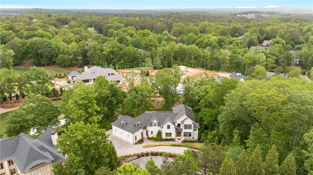 1285 Stuart Ridge Johns Creek, GA 30022 - Photo 7 of 89 an aerial view of a house with a yard