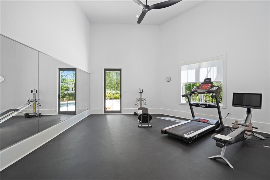 1285 Stuart Ridge Johns Creek, GA 30022 - Photo 72 of 89 a view of a room with gym equipment and a window