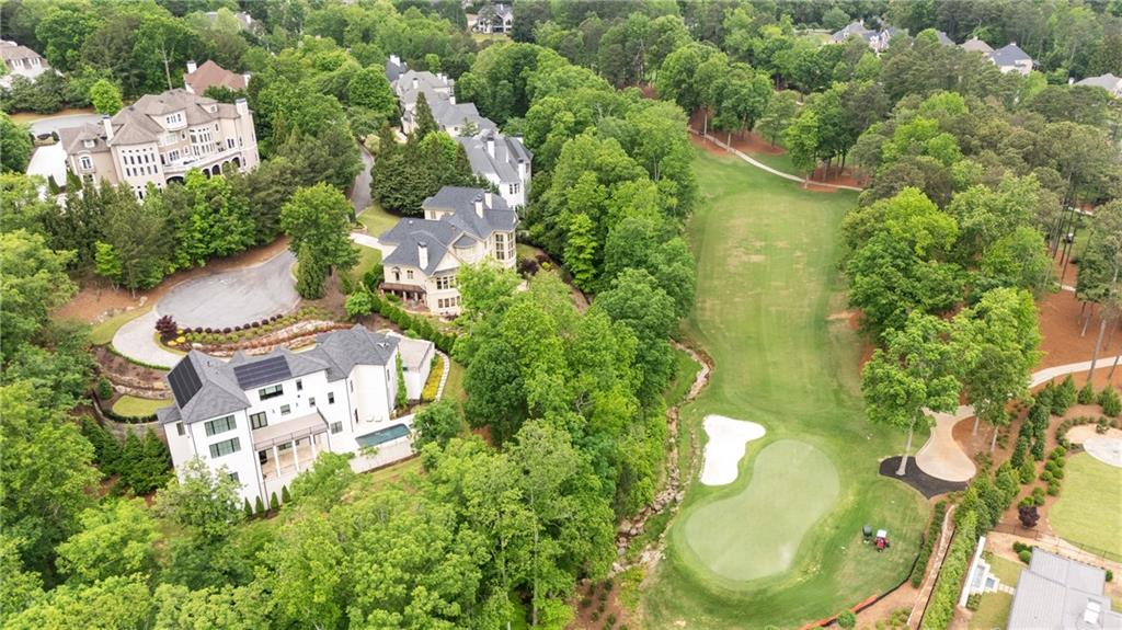 1285 Stuart Ridge Johns Creek, GA 30022 - Photo 84 of 89 an aerial view of a house with swimming pool and garden view