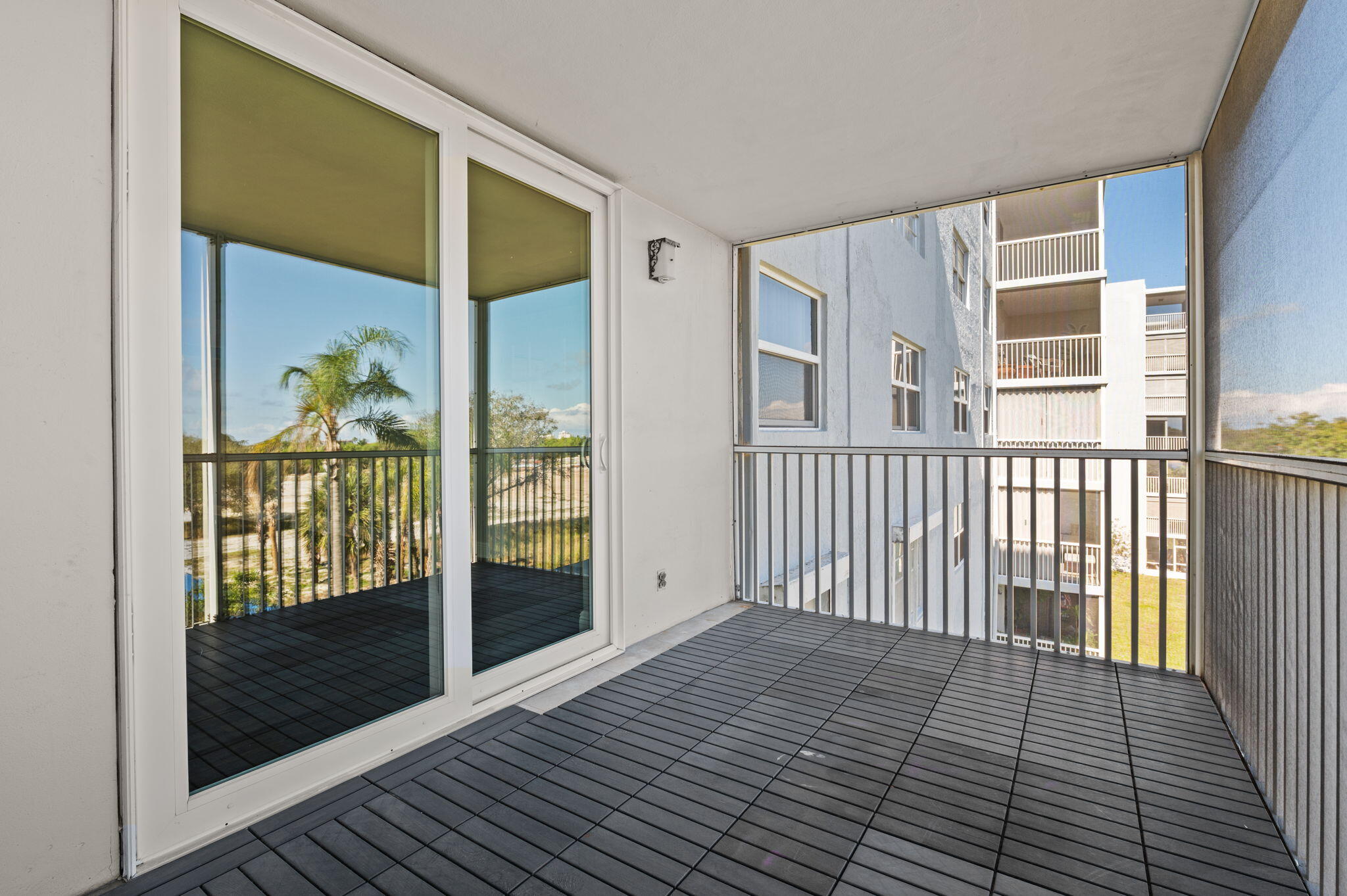 5700 Northwest 2nd Avenue, Unit 410 Boca Raton, FL 33487 - Photo 28 of 34 a view of a balcony from door