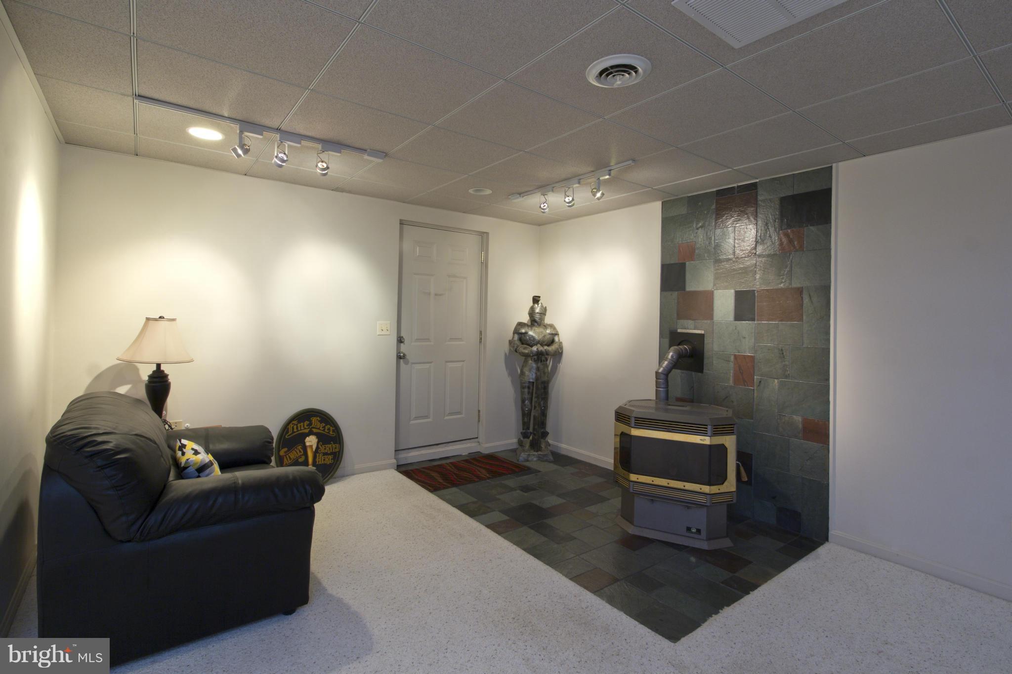 226 Arundel Road Pasadena, MD 21122 - Photo 10 of 30 Pellet Stove in the Family Room