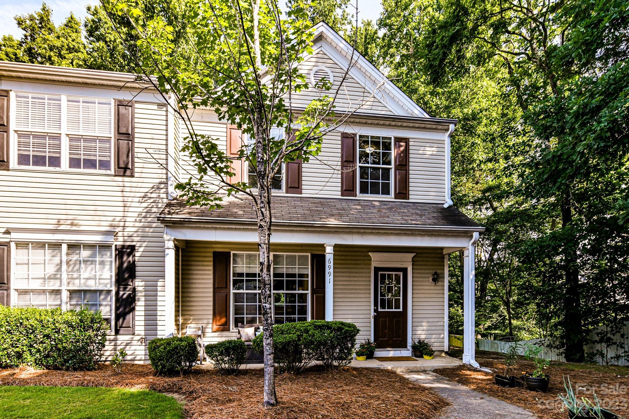 6991 Rothchild Drive Charlotte, NC 28270 - Photo 1 of 37 front view of a house and a yard