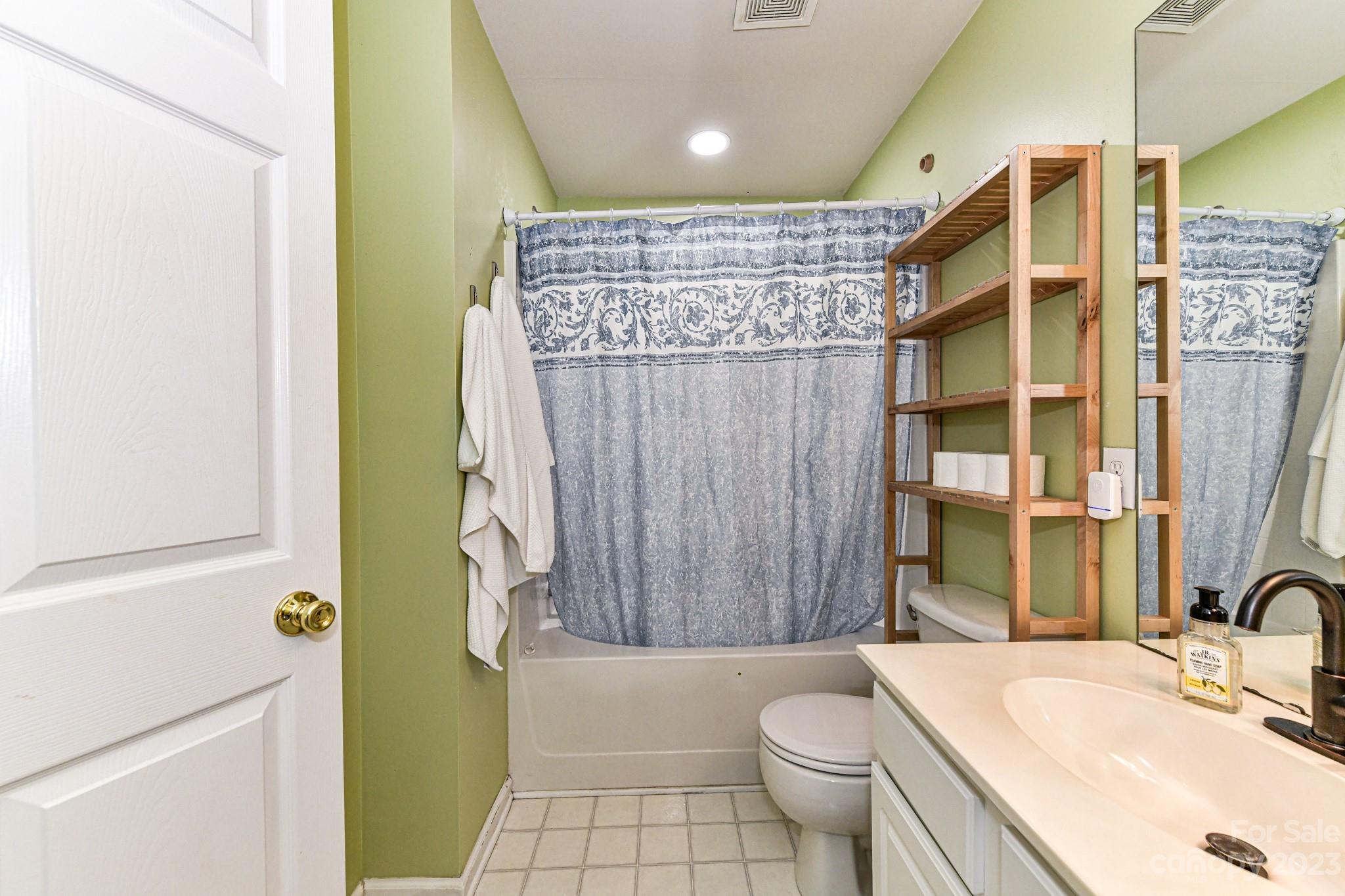 6991 Rothchild Drive Charlotte, NC 28270 - Photo 18 of 37 a bathroom with a sink toilet and shower