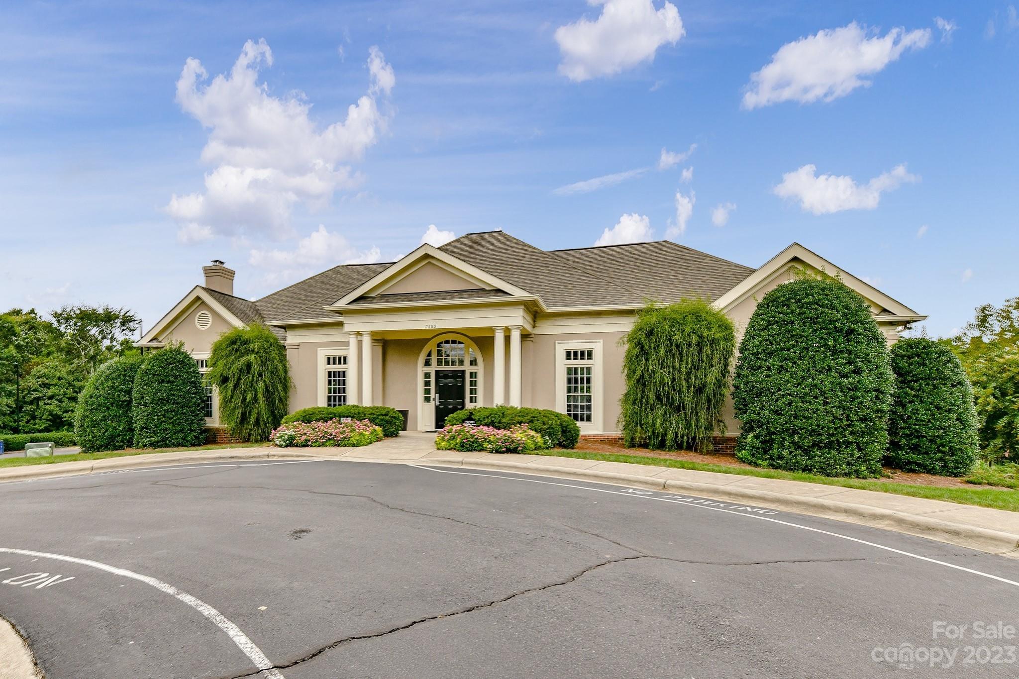 6991 Rothchild Drive Charlotte, NC 28270 - Photo 27 of 37 a front view of a house with a garden