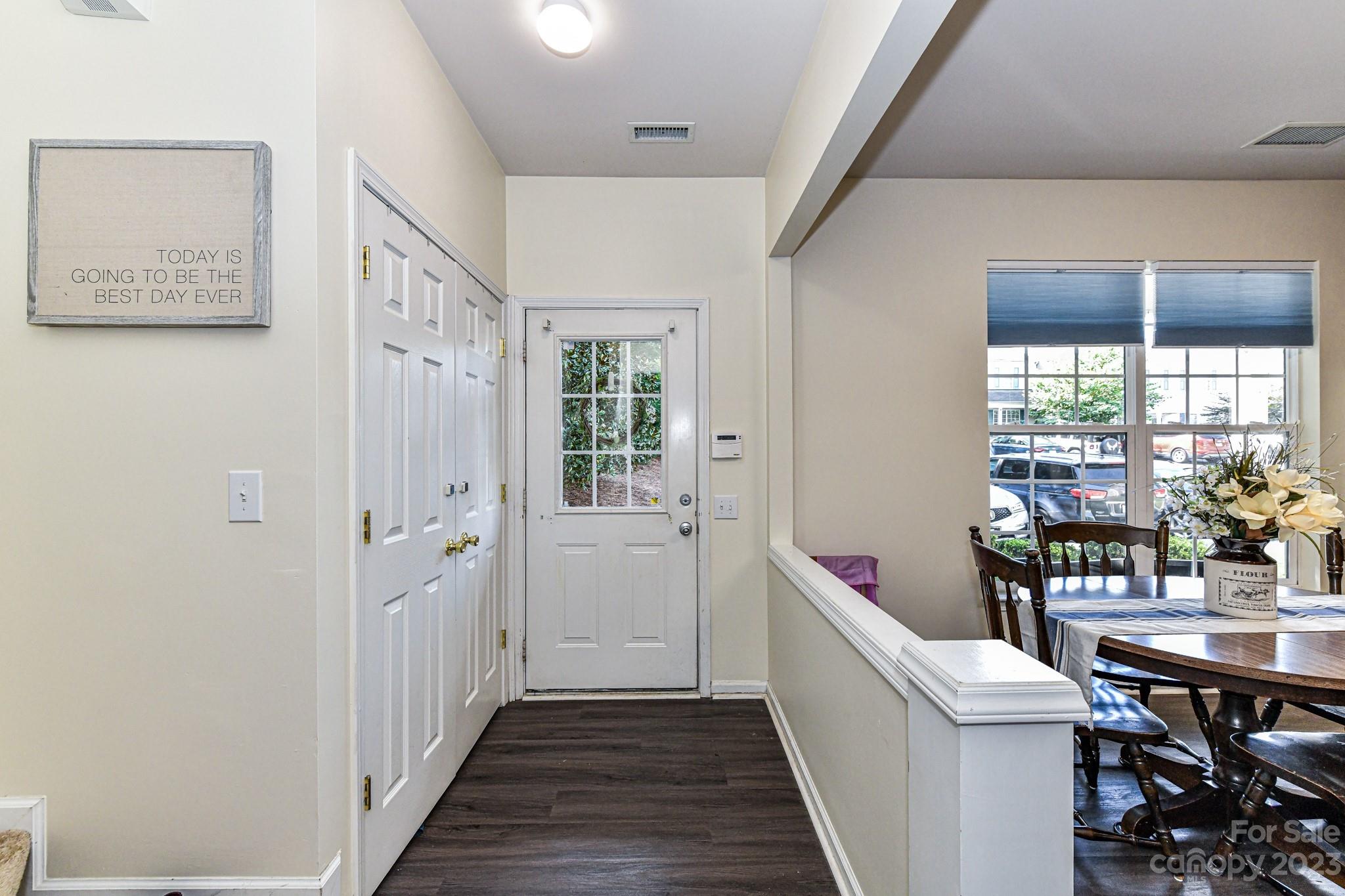 6991 Rothchild Drive Charlotte, NC 28270 - Photo 3 of 37 a hallway with furniture and window