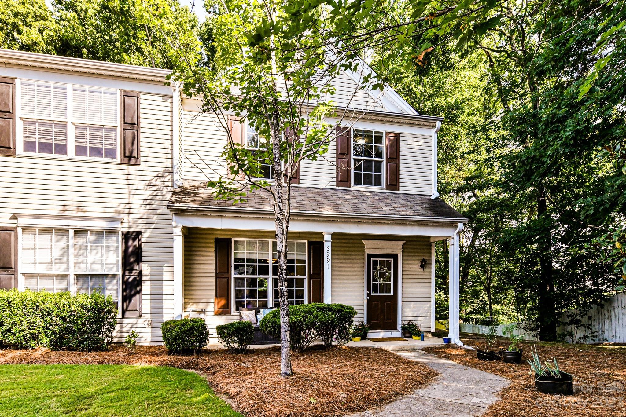 6991 Rothchild Drive Charlotte, NC 28270 - Photo 37 of 37 front view of a house with a yard