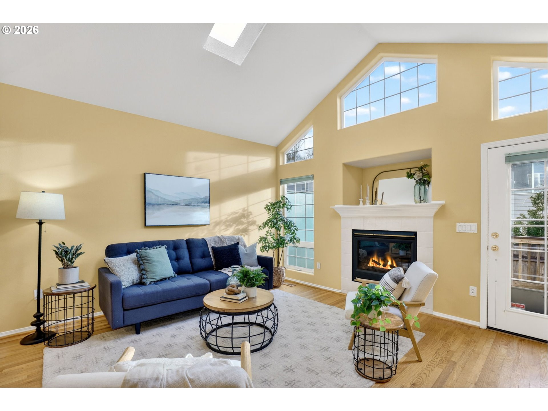 4714 Southwest 2nd Court Portland, OR 97239 - Photo 13 of 44 a living room with furniture and a fireplace