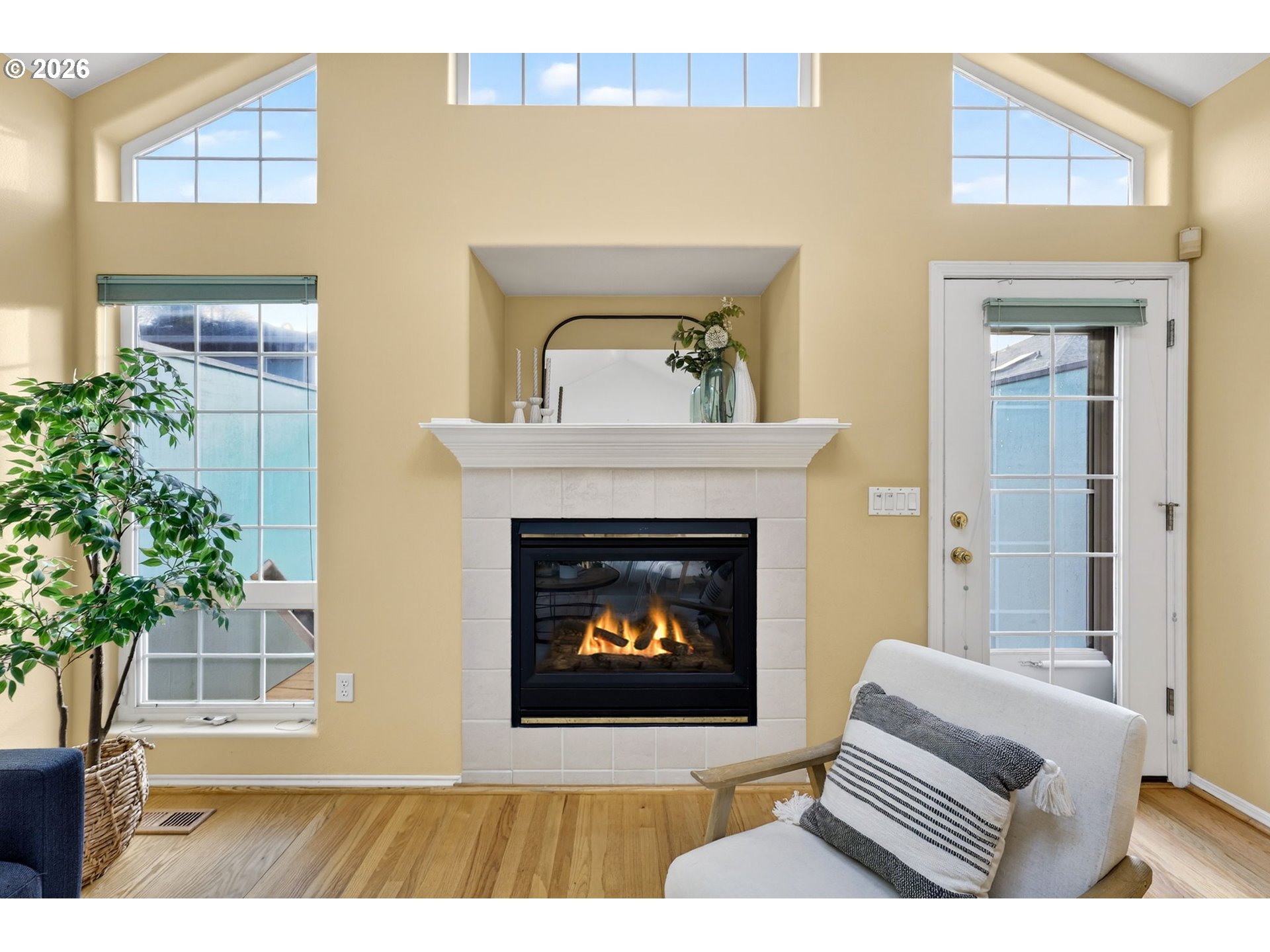 4714 Southwest 2nd Court Portland, OR 97239 - Photo 14 of 44 a living room with furniture and a fireplace