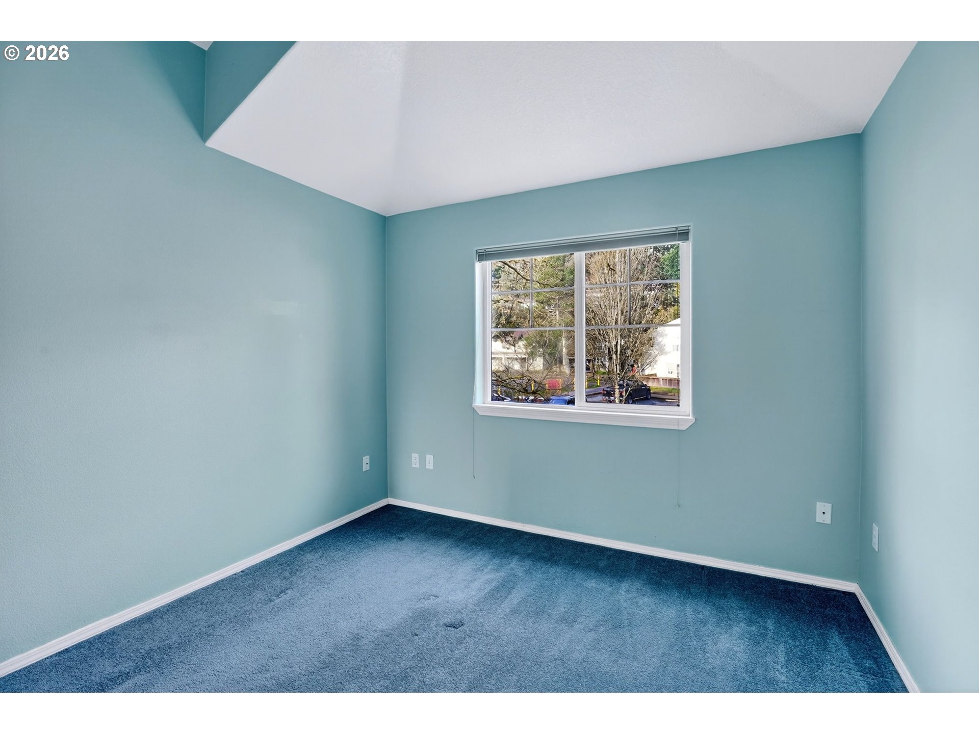 4714 Southwest 2nd Court Portland, OR 97239 - Photo 28 of 44 an empty room with wooden floor and windows