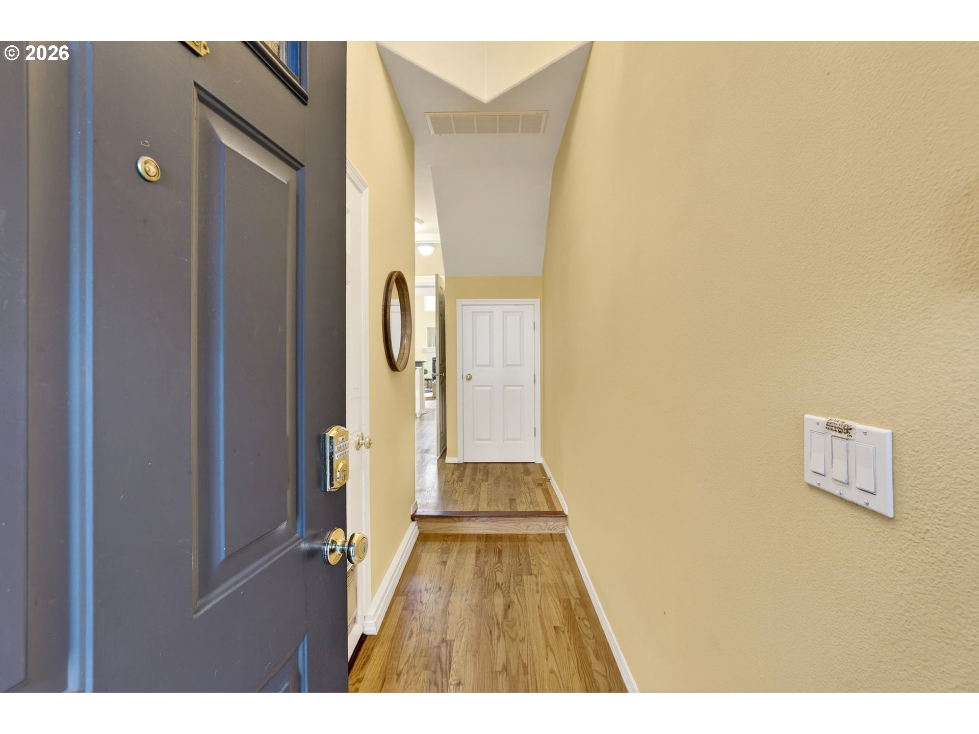 4714 Southwest 2nd Court Portland, OR 97239 - Photo 3 of 44 a view of a hallway with wooden floor