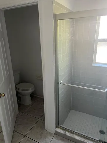 an empty room with a white door