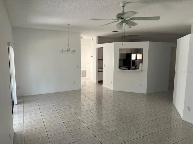 a view of a hallway with a white walls
