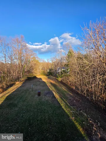 a view of a yard with an outdoor space